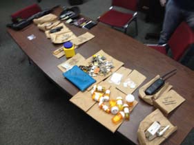 Convicted felon arrested on gun and drug charges